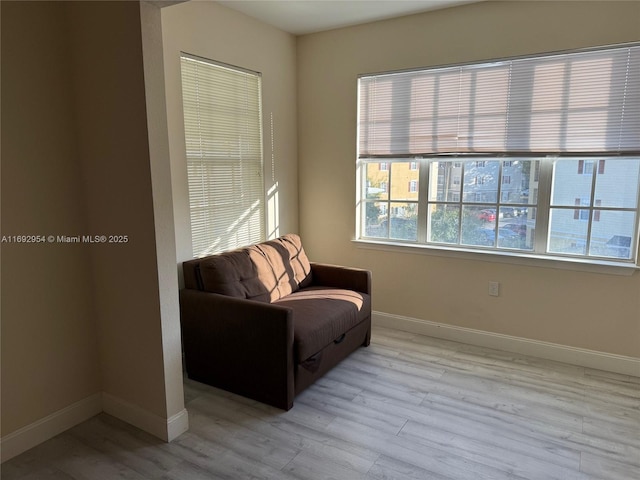 8239 Claire Ann Dr Unit 307, Orlando, FL 32825 - living area with light hardwood / wood-style flooring