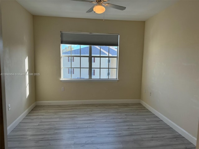 8239 Claire Ann Dr Unit 307, Orlando, FL 32825 - empty room featuring ceiling fan and light hardwood / wood-style floors