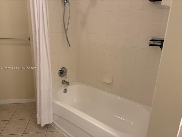 8239 Claire Ann Dr Unit 307, Orlando, FL 32825 - bathroom with tile patterned flooring and shower / tub combo