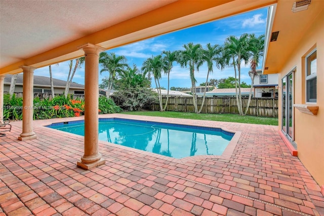 view of pool featuring a patio