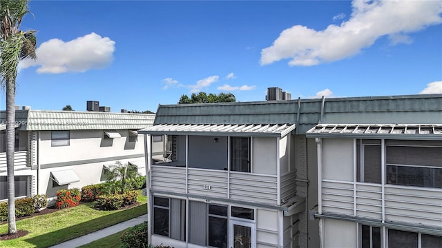 exterior space featuring central AC unit