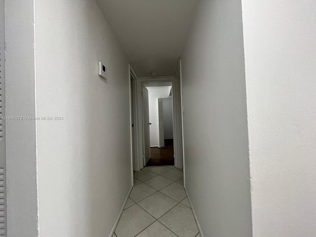 4344 NW 9th Ave Unit 9-3D, Deerfield Beach, FL 33064 - corridor with light tile patterned floors