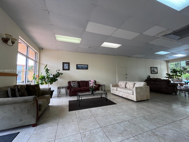4344 NW 9th Ave Unit 9-3D, Deerfield Beach, FL 33064 - tiled living room featuring a paneled ceiling