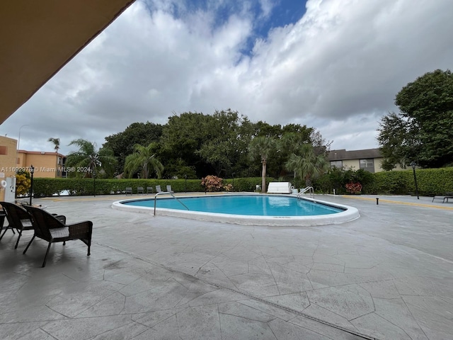 view of pool with a patio area