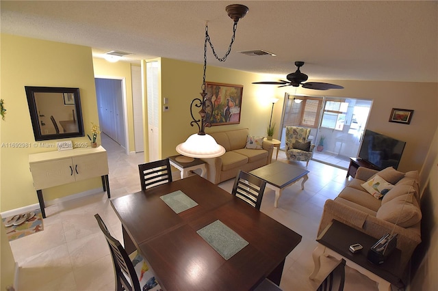 2688 E Dudley Dr Unit H, West Palm Beach, FL 33415 - dining room with ceiling fan, a textured ceiling, and baseboards