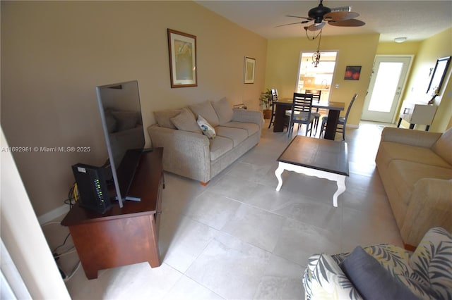 living room with ceiling fan