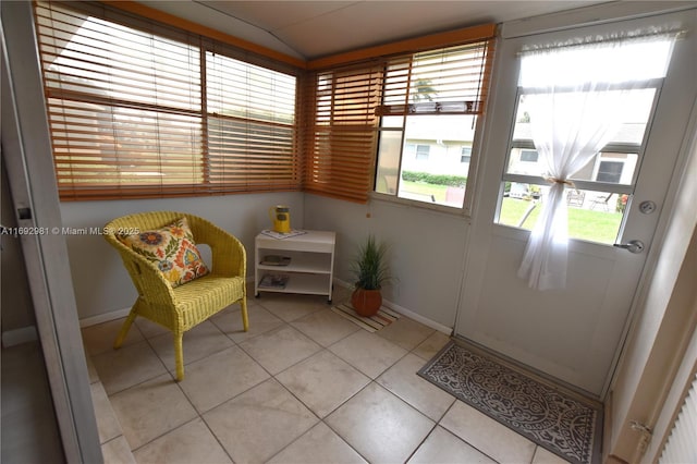 sunroom / solarium with vaulted ceiling