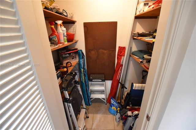 2688 E Dudley Dr Unit H, West Palm Beach, FL 33415 - walk in closet with tile patterned flooring