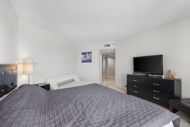 bedroom with a textured ceiling