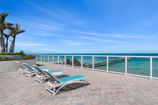 view of patio featuring a water view