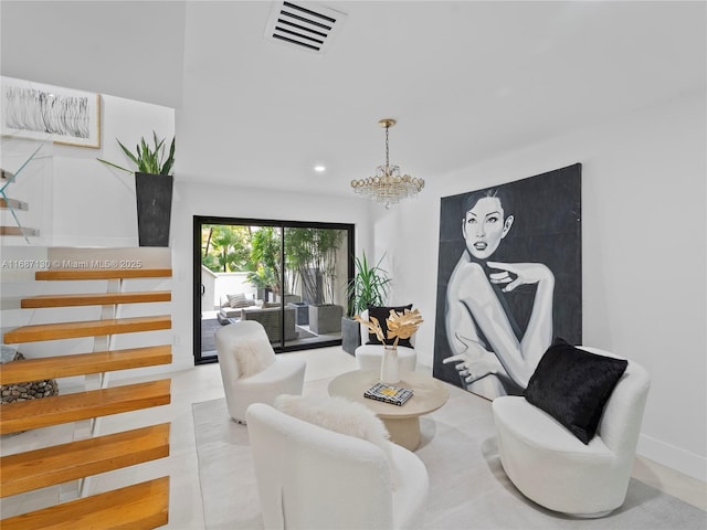 dining space with visible vents and a notable chandelier