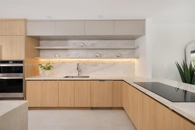 2000 S Bayshore Dr Unit 4, Coconut Grove, FL 33133 - kitchen featuring a sink, light brown cabinetry, and modern cabinets