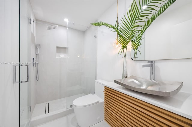 2000 S Bayshore Dr Unit 4, Coconut Grove, FL 33133 - bathroom featuring toilet, a stall shower, and vanity