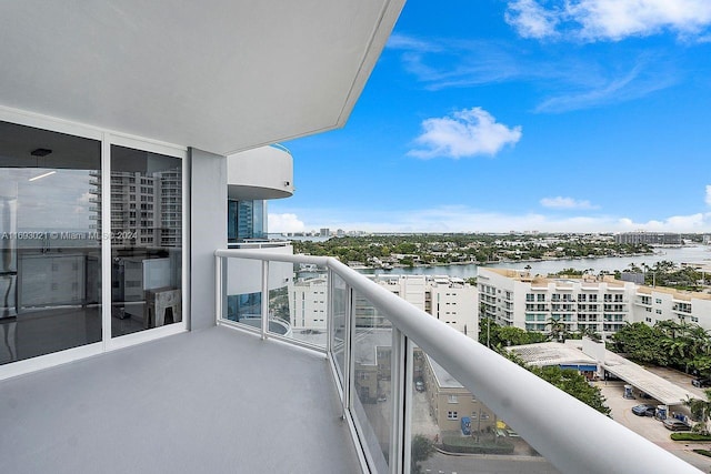 balcony featuring a water view