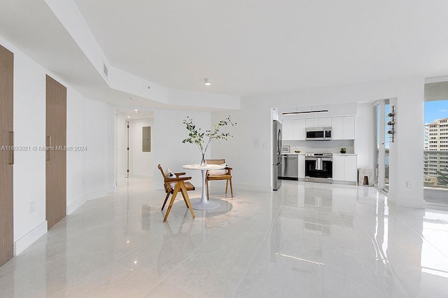 dining area featuring electric panel