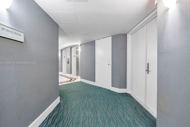 6301 Collins Ave Unit 1508, Miami Beach, FL 33141 - hallway with carpet floors and baseboards