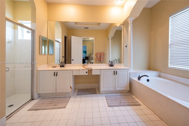 bathroom with vanity, plus walk in shower, and ornate columns