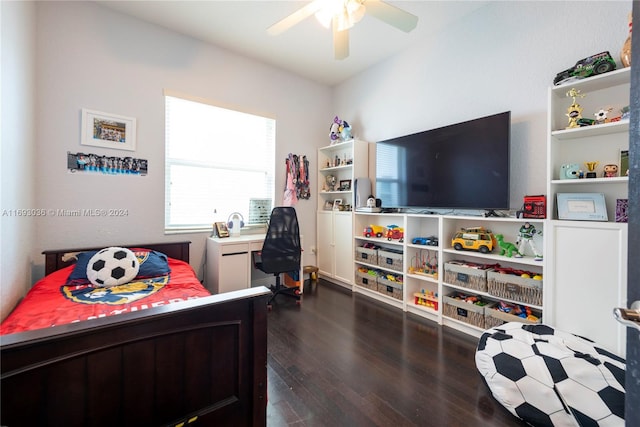 bedroom featuring ceiling fan and dark hardwood / wood-style floors