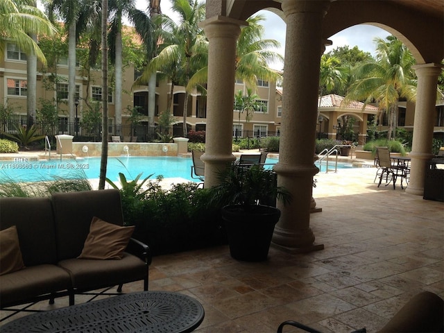 view of pool with a patio area