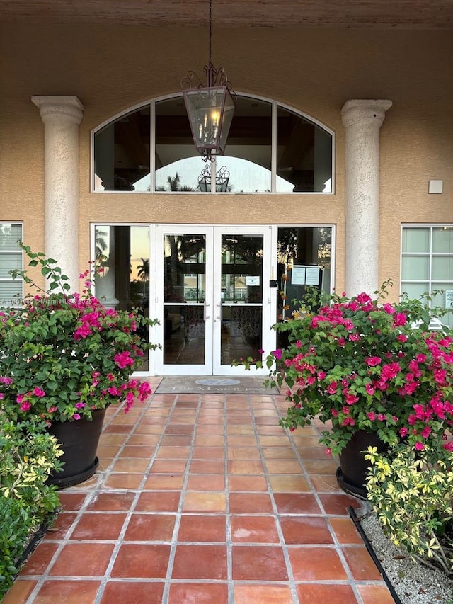 property entrance featuring french doors