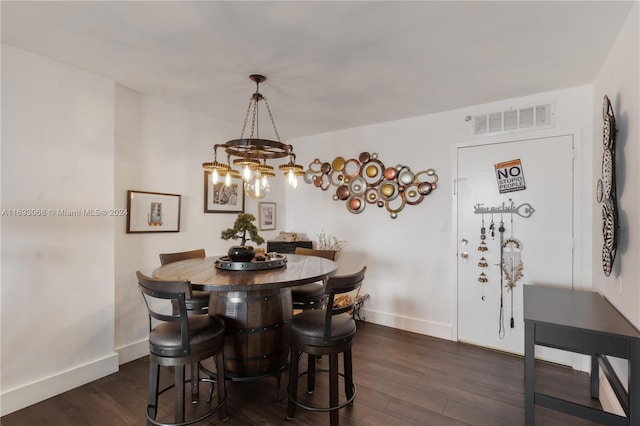 dining room featuring dark wood-type flooring