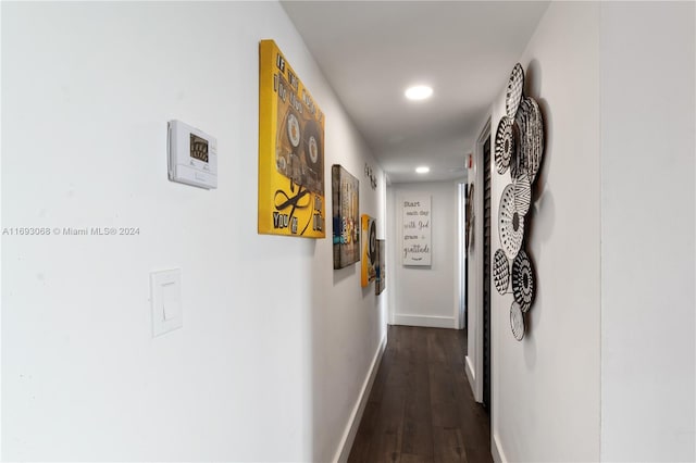 hall featuring dark wood-type flooring