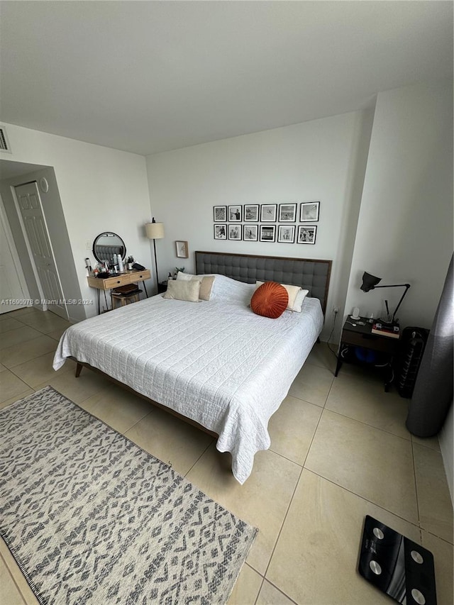 bedroom featuring tile patterned flooring