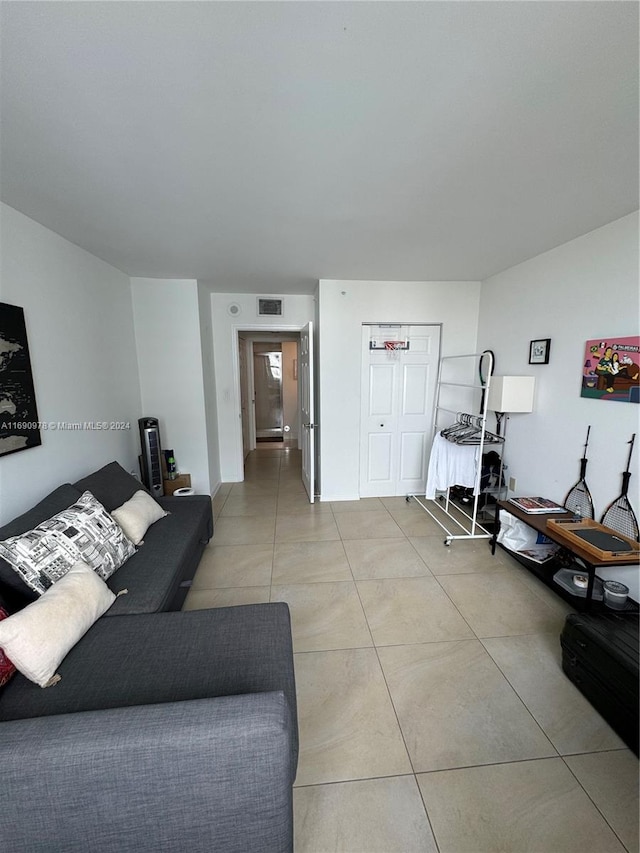 living room featuring light tile patterned floors