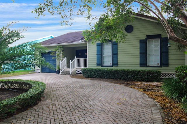 view of front of home with a garage