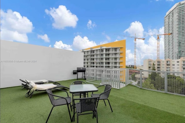 481 NE 29th St Unit 702, Miami, FL 33137 - view of patio with grilling area and a balcony
