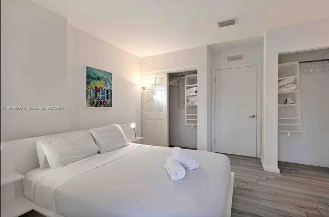 481 NE 29th St Unit 702, Miami, FL 33137 - bedroom featuring wood finished floors