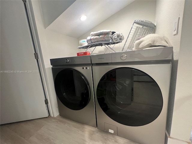 laundry area with separate washer and dryer