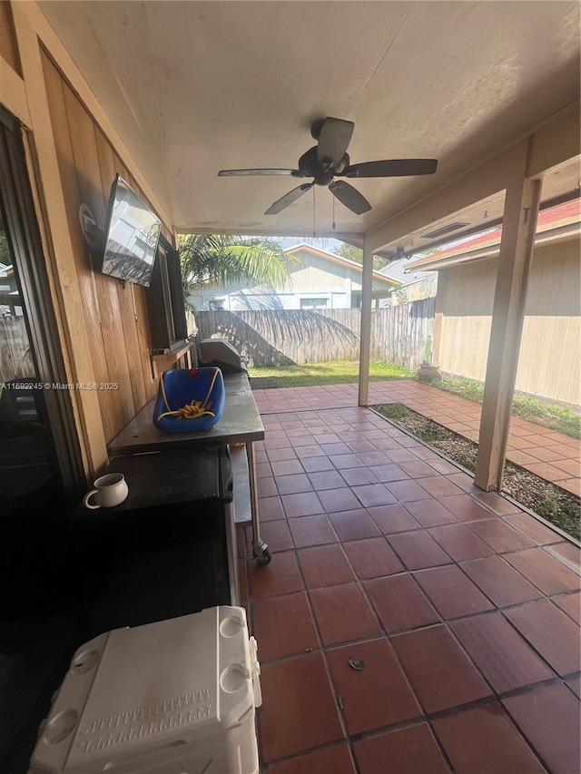 view of patio / terrace featuring ceiling fan