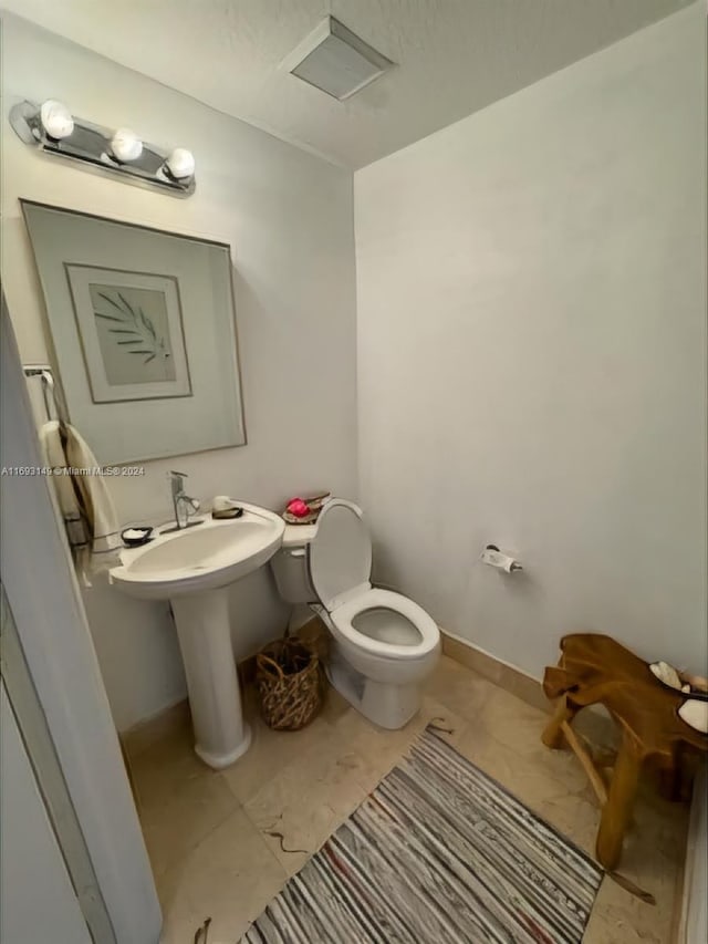 bathroom featuring toilet