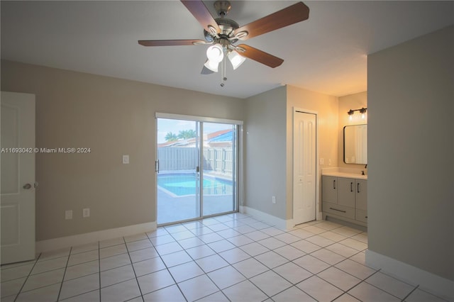 interior space featuring ceiling fan