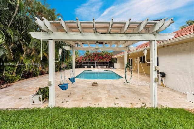 view of pool with a pergola and a patio