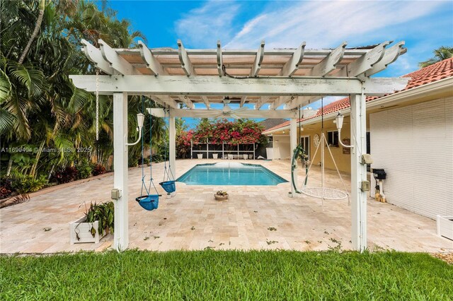 view of pool featuring a patio area and a pergola