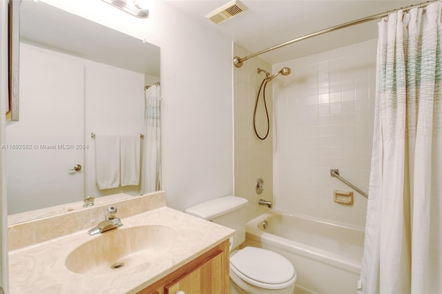 full bathroom featuring toilet, vanity, and shower / bathtub combination with curtain