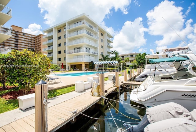 dock area featuring a community pool