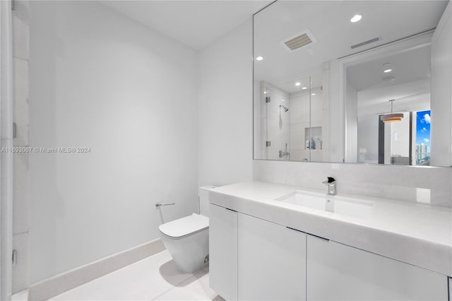 bathroom with walk in shower, vanity, toilet, and tile patterned floors