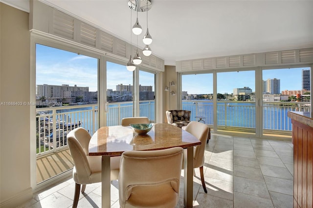 sunroom with a water view