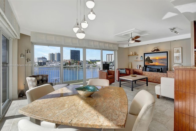 dining room with ceiling fan