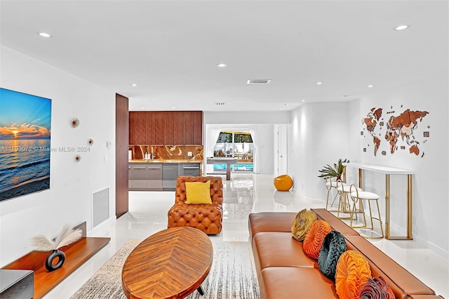 living room featuring sink