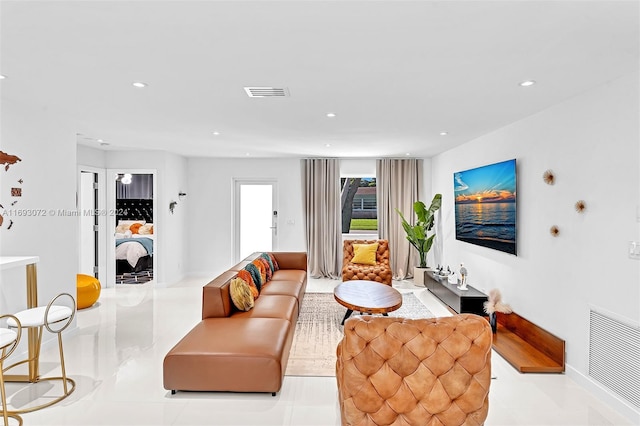 living room featuring light tile patterned floors