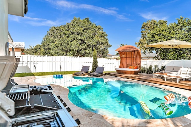 view of pool with a deck