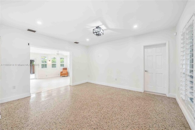 spare room featuring ceiling fan