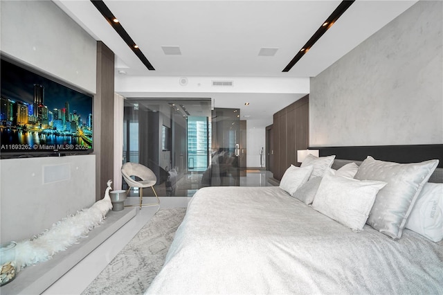 bedroom with visible vents and a ceiling fan