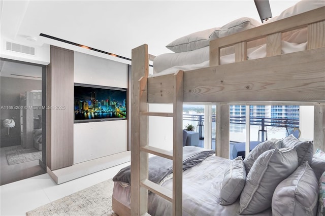 tiled bedroom featuring visible vents