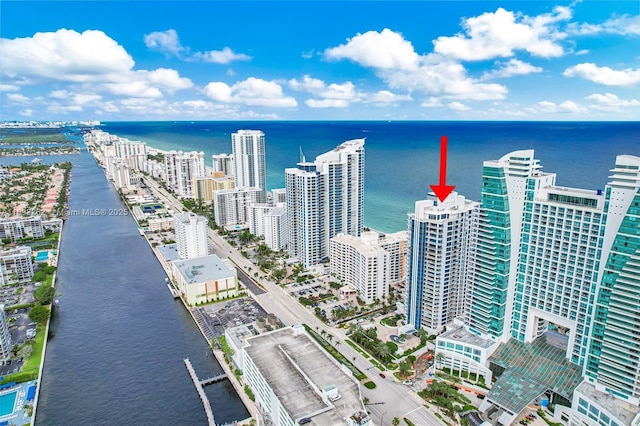 aerial view featuring a water view and a city view