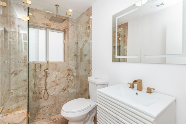 bathroom with toilet, an enclosed shower, and sink